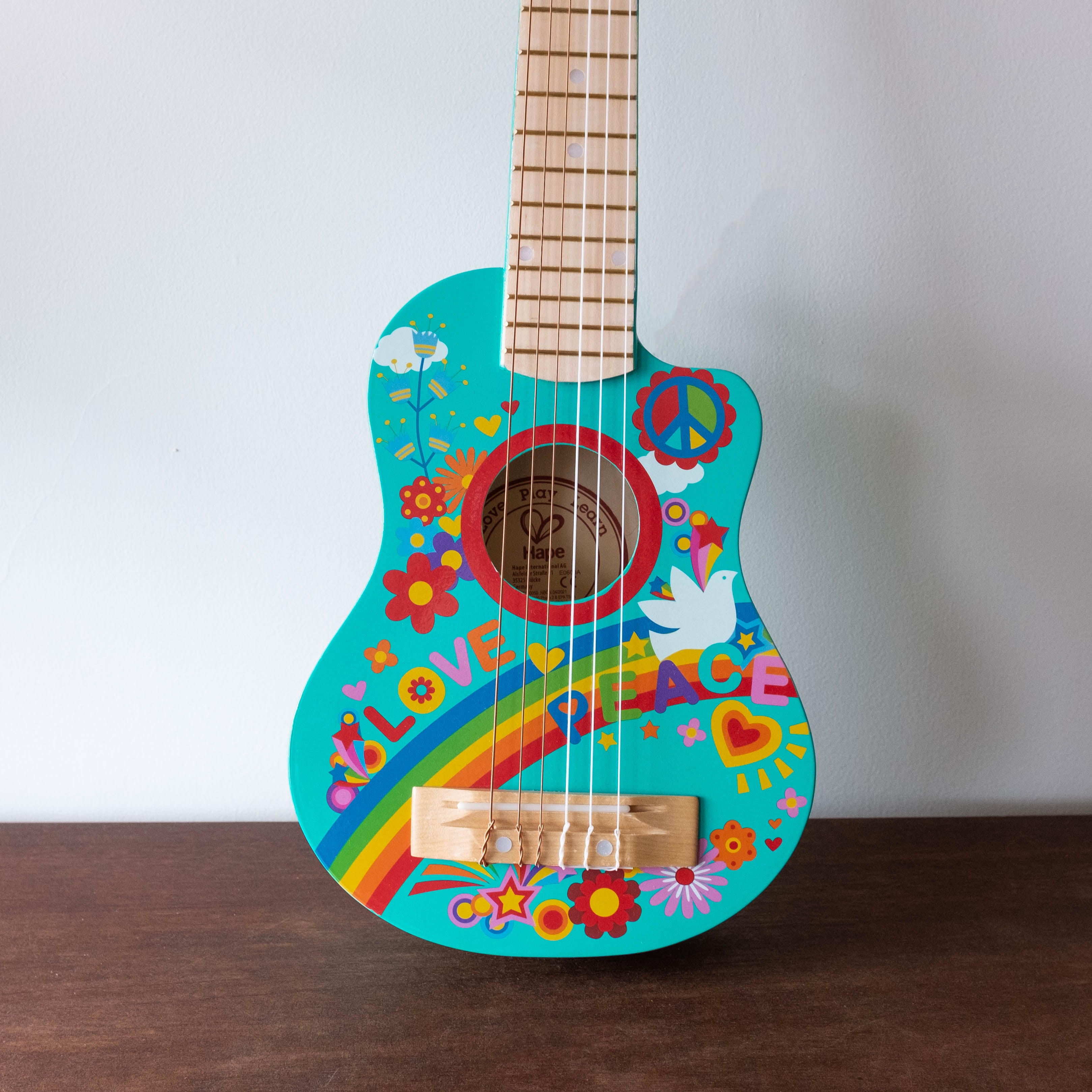 Wooden Love and Peace Guitar
